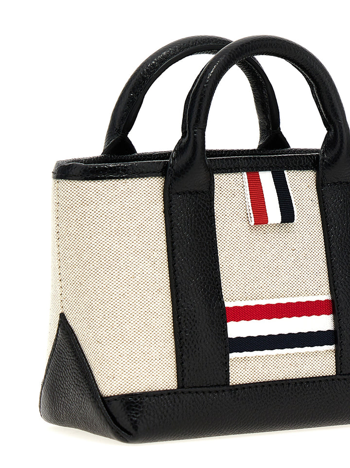 Thom Browne Micro Tool Tote Borse a Mano - Nero | b35876de8fa22e5d186fc63ad4175e2e84bc85d1