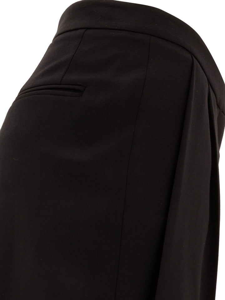 Givenchy Wool Pleated Trouses Trousers - Nero | 08e460aadb22d7df8cca5dcc3a848d961da56c21