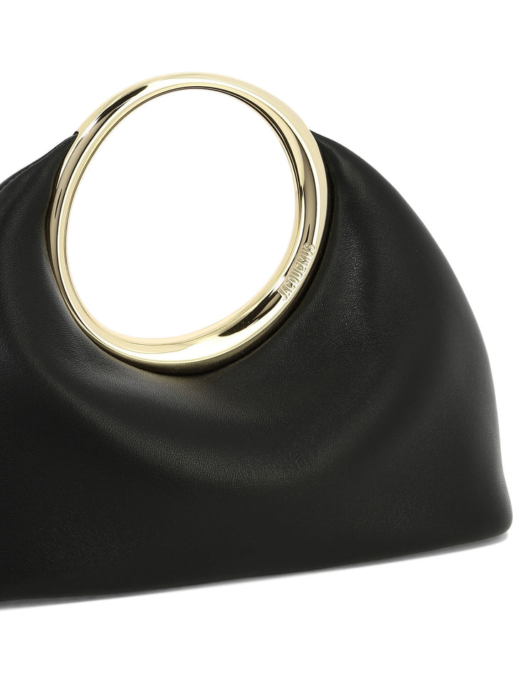 Jacquemus Calino Clutches - Nero | e74e5b76bf272aac8c014cf0a1bb07defad29c49