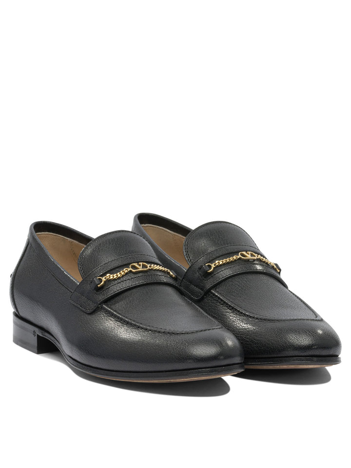 Valentino Garavani Vlogo Signature Loafers & Slippers - Nero | 23e874787af60c133459f13d805bd2c56a21b5d2