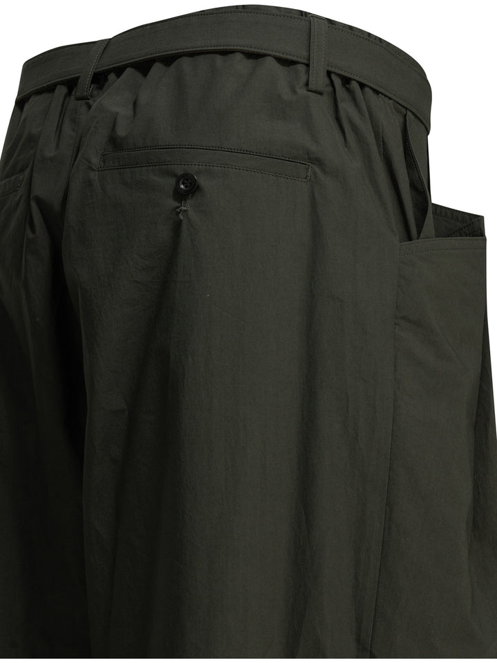 Sacai Typewriter Trousers - Verde | e5eaeef261bb0c5285640ba3b3fa19d72cf75b3d