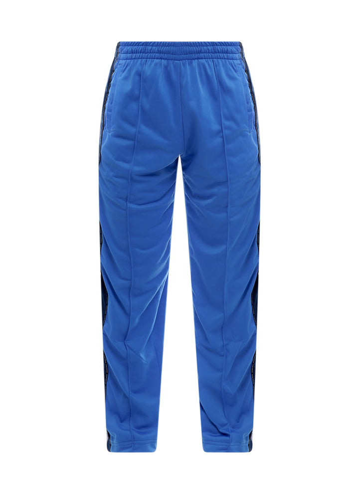 Pantalone in nylon con profili logati