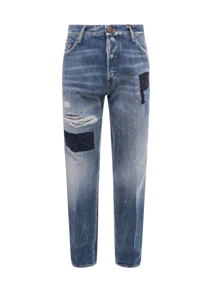Jeans in denim con effetto strappato