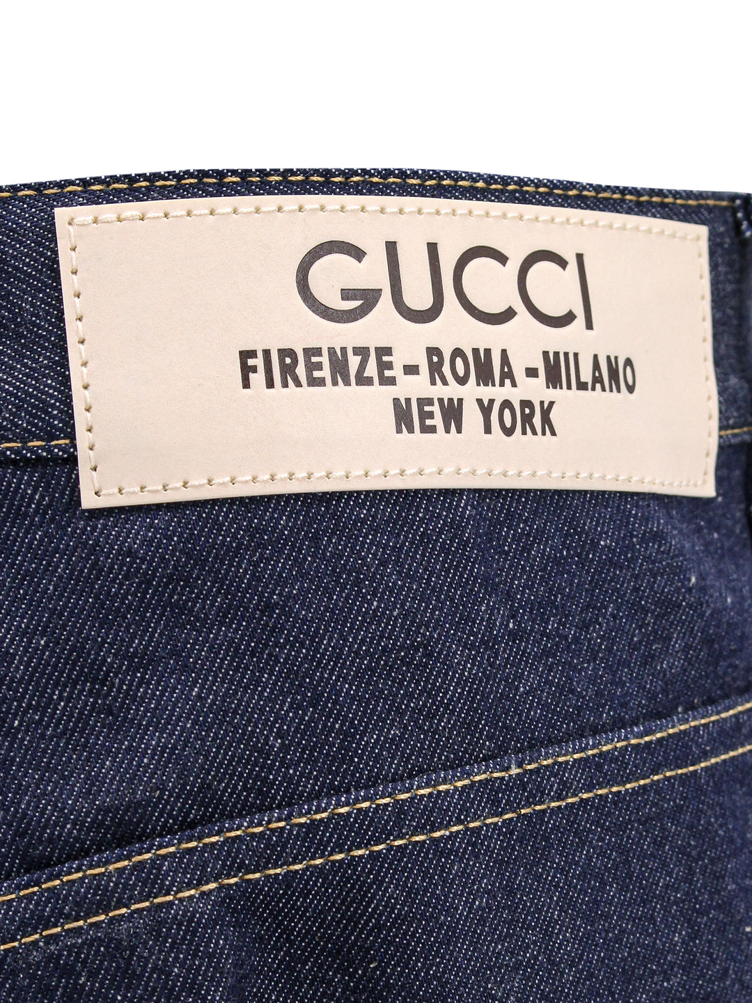 Jeans in cotone con etichetta Gucci City