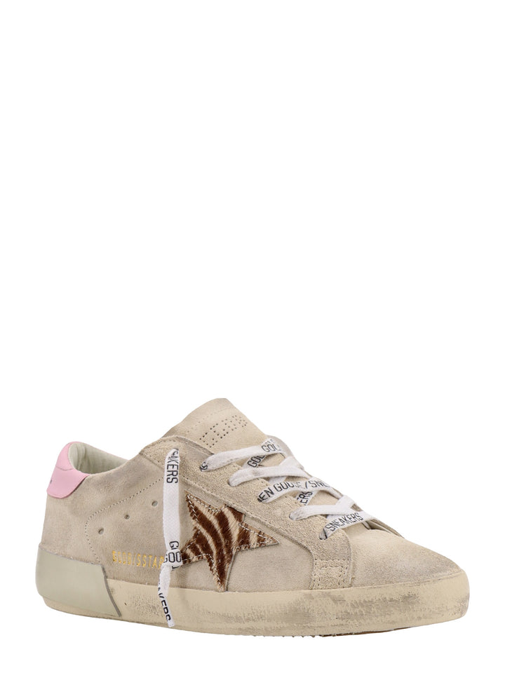 Sneakers in suede con patch in pelle