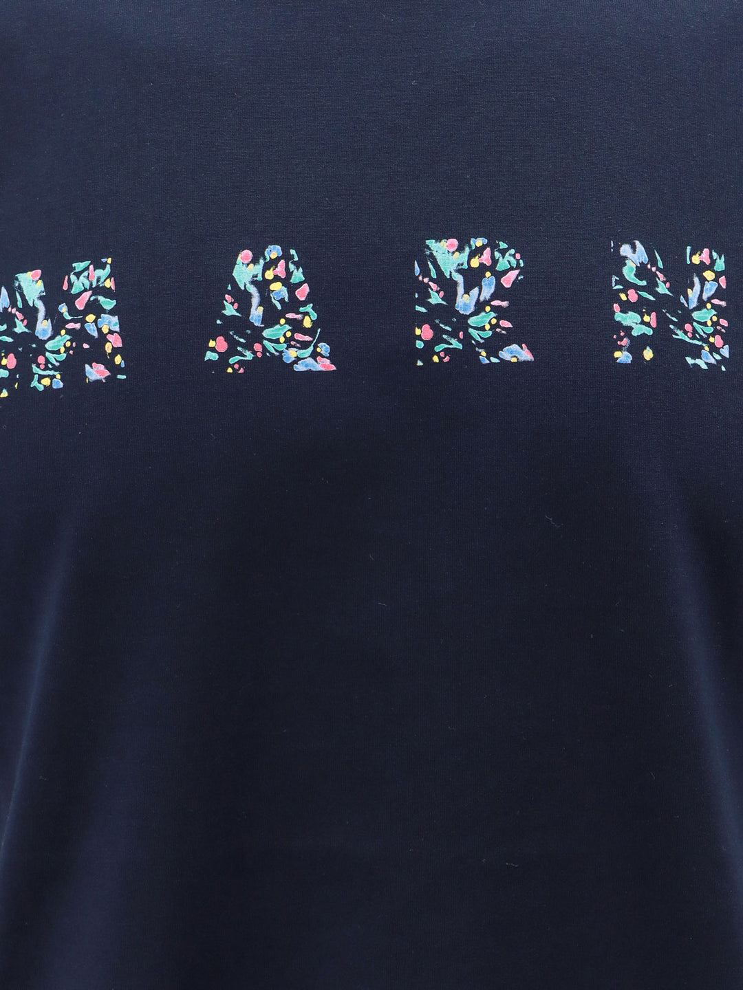 T-shirt in cotone organico con stampa floral logo