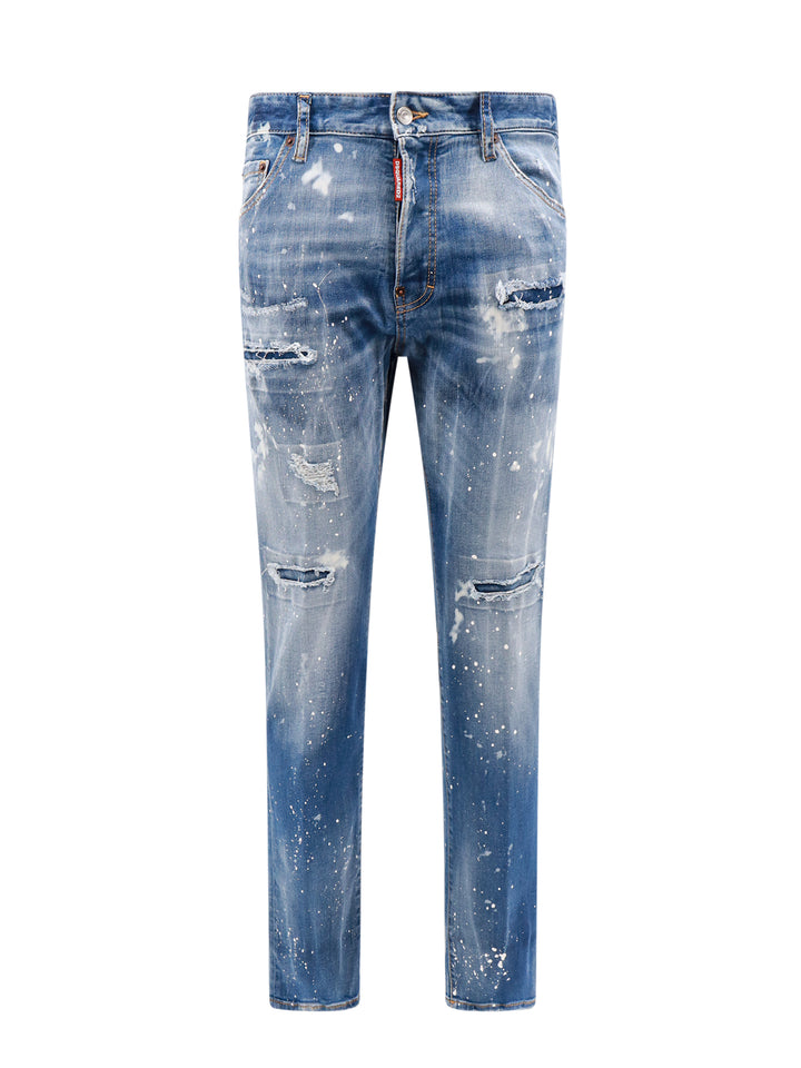 Jeans in cotone stretch con effetto strappato e macchie di vernice