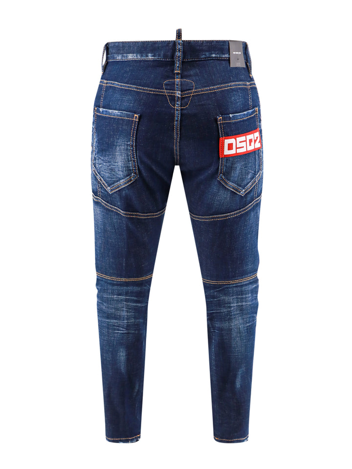 Jeans in cotone stretch con patch logo posteriore