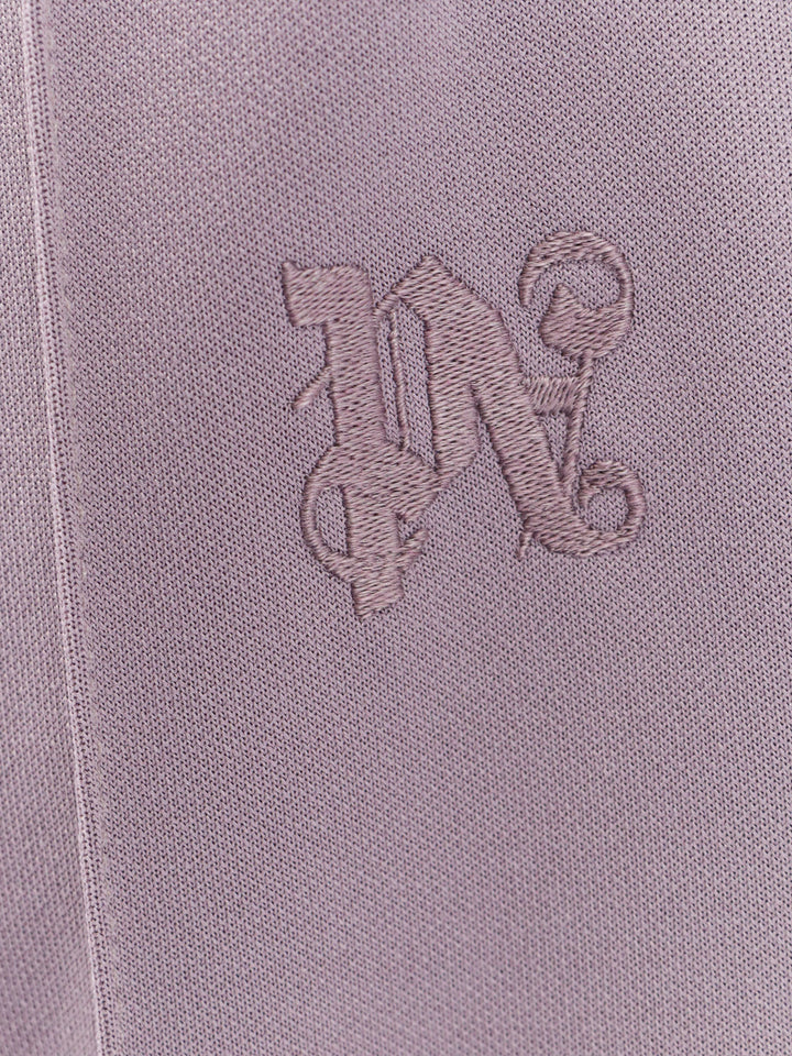 Pantalone con iconico monogramma ricamato