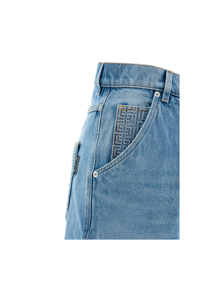 Jeans in cotone con monogramma posteriore in rilievo
