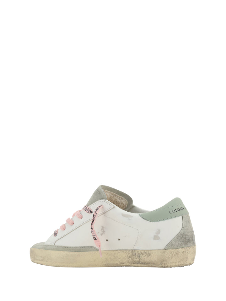 Sneakers in pelle con patch logo laterale