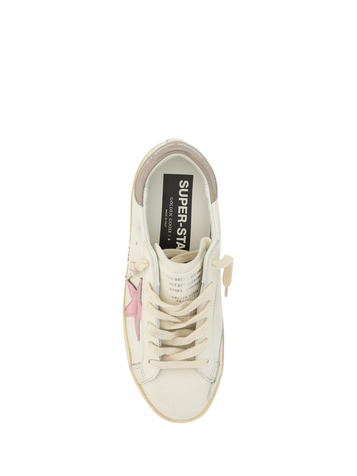 Sneakers in pelle con patch logo laterale