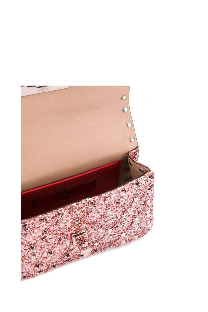 Borsa Rockstud Spike mini in pelle glitter rosa